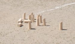 Mölkky® wooden sticks during a game.